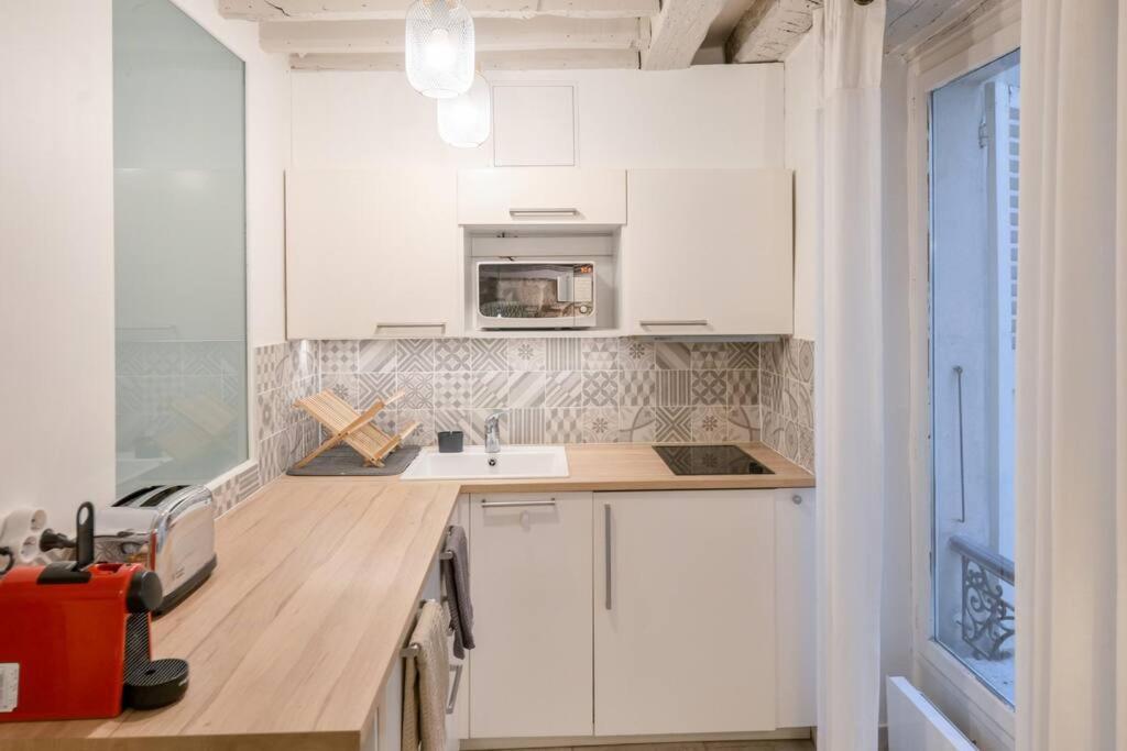 Cosy Appartement En Plein Marais Parigi Esterno foto